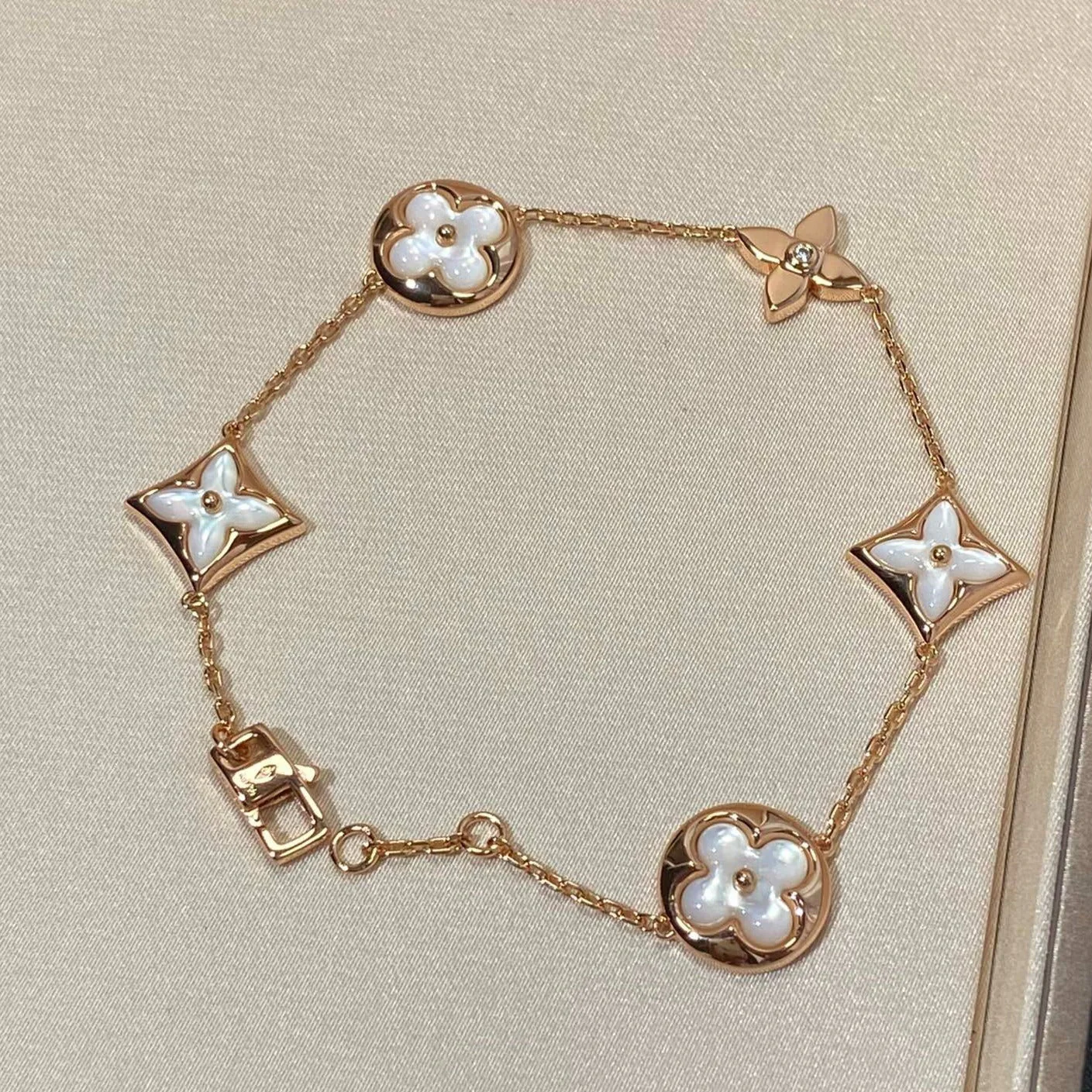[Louis vuitton]STAR AND SUN 5 MOTIF MOP PINK GOLD BRACELET