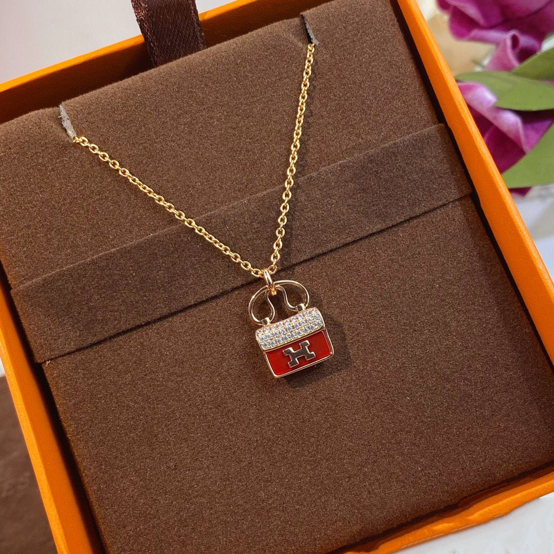 [Hermes]CONSTANCE RED PEDANT PINK GOLD NECKLACE