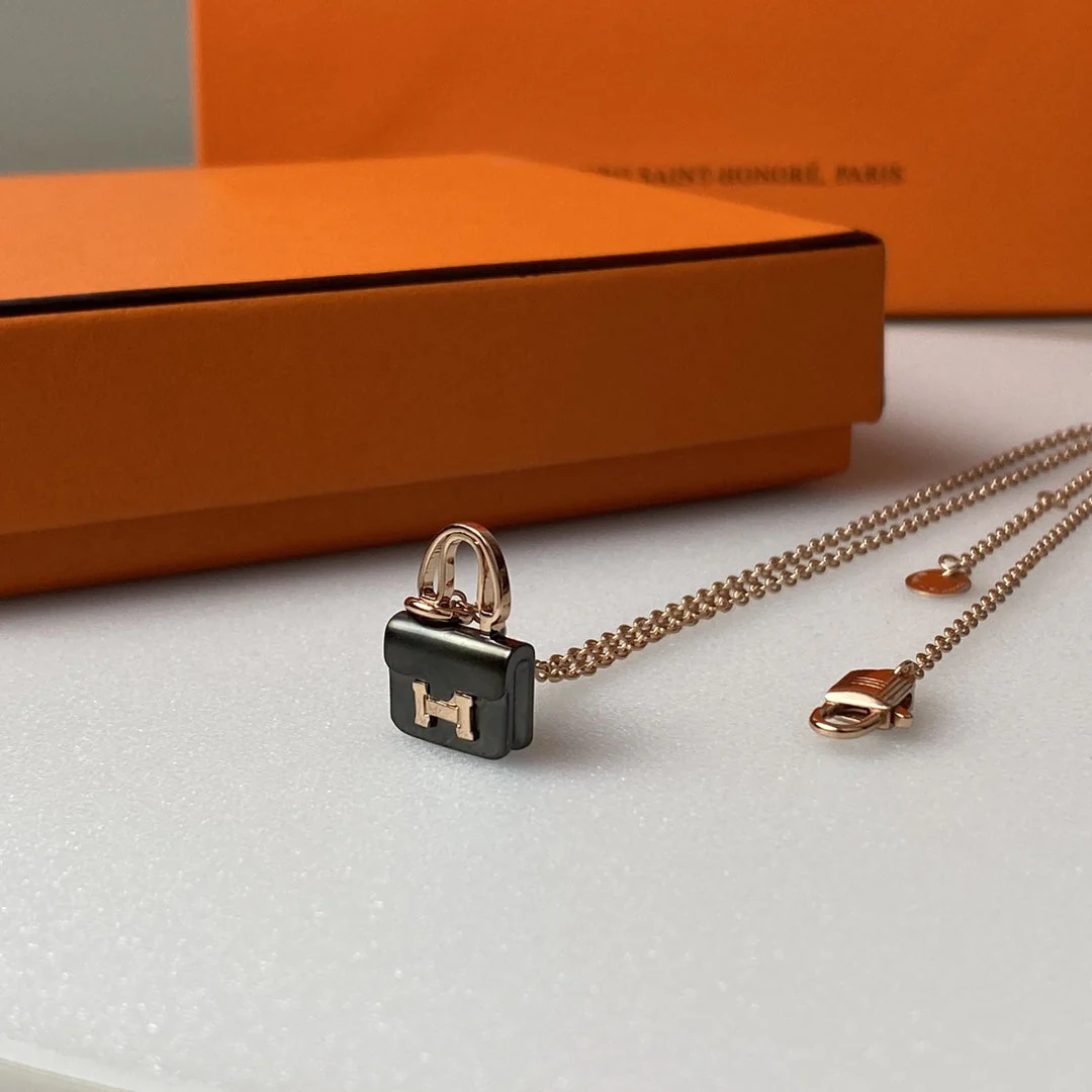 [Hermes]CONSTANCE BLACK PEDANT PINK GOLD NECKLACE
