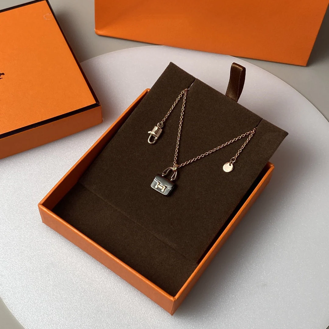 [Hermes]CONSTANCE BLACK PEDANT PINK GOLD NECKLACE