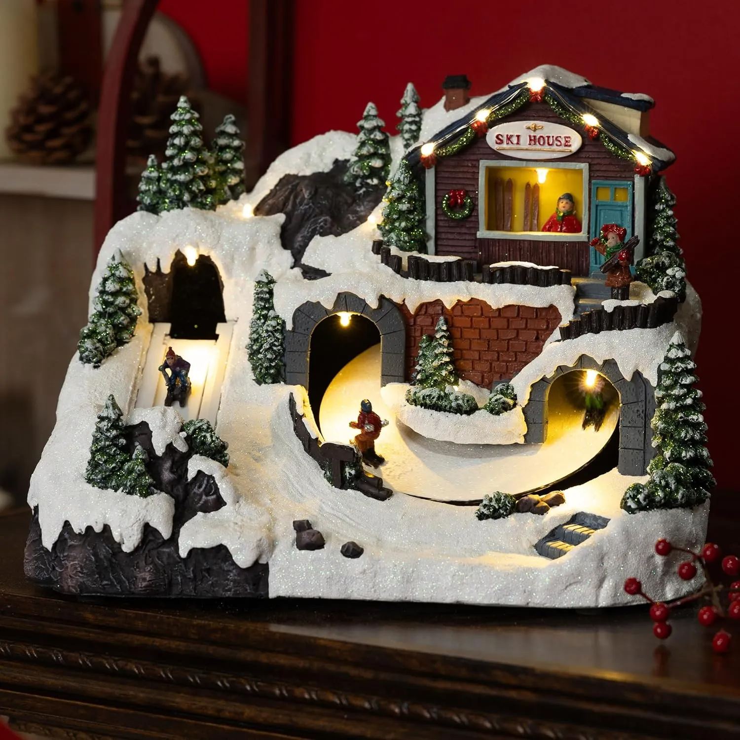 Alpine Corporation Animated Christmas Ski Resort Holiday Tabletop Decor with 12 Warm White LED Lights
