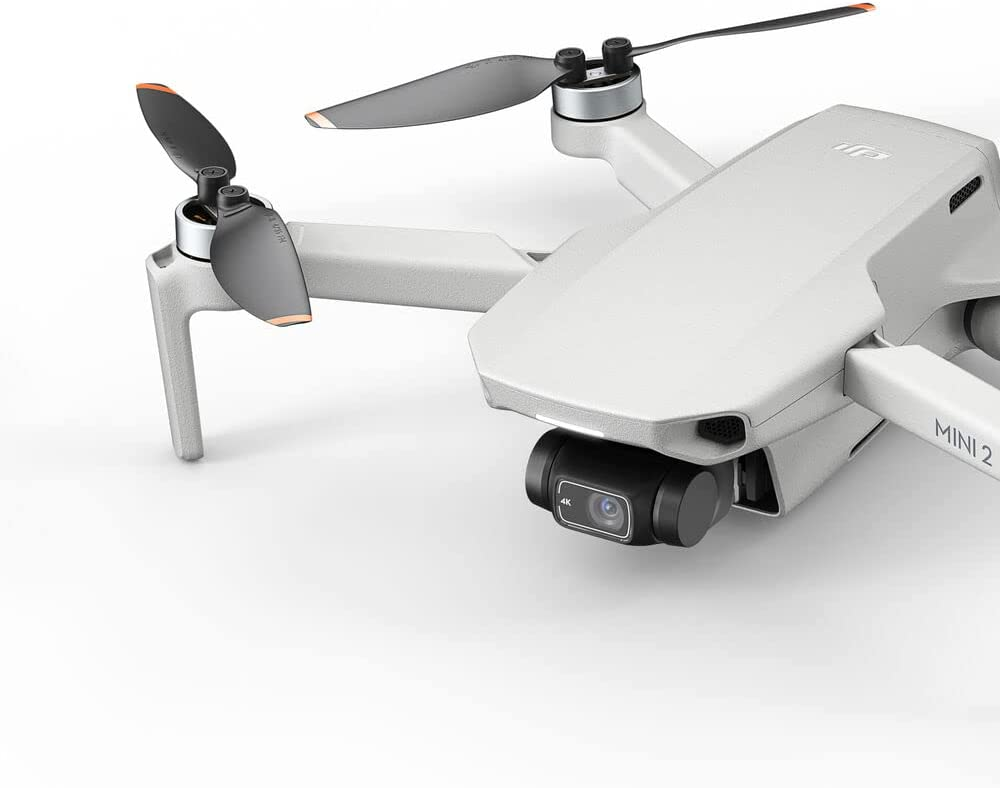 DJI Mini 2 Fly More Combo – Ultralight Foldable Drone, 3-Axis Gimbal with 4K Camera, 12MP Photos, 31 Mins Flight Time, Case, 128gb SD Card, Landing pad Kit with Must Have Accessories