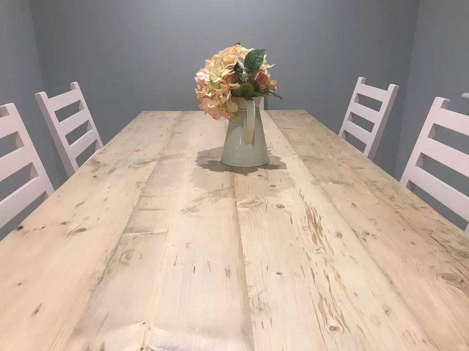 Farmhouse dining table with reclaimed wood top and 6 chairs