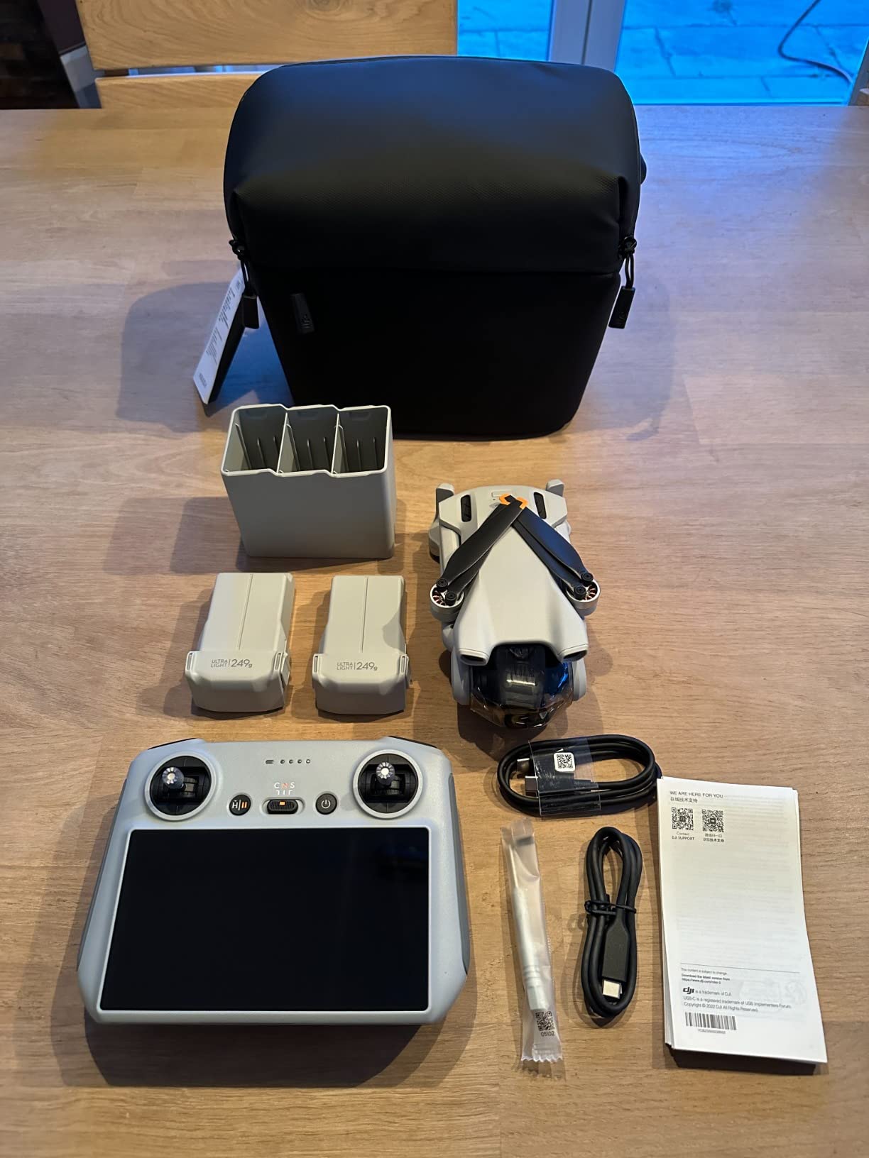 DJI Mini 3 Fly More Combo (DJI RC), Lightweight 3x Mechanical Gimbal Mini Camera Drone with 4K HDR Video, 3 Batteries for 114-min Flight Time, Vertical Shooting, 32800ft (10km) Video Transmission