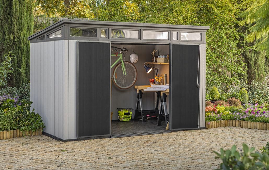 Keter Kunststoff Gerätehaus 11x7 – Wetterfestes Gartenhaus mit Boden, Doppeltüren & Fenster, Fahrradschuppen, Ideal für Outdoor-Geräteschuppen, 342x218x226cm