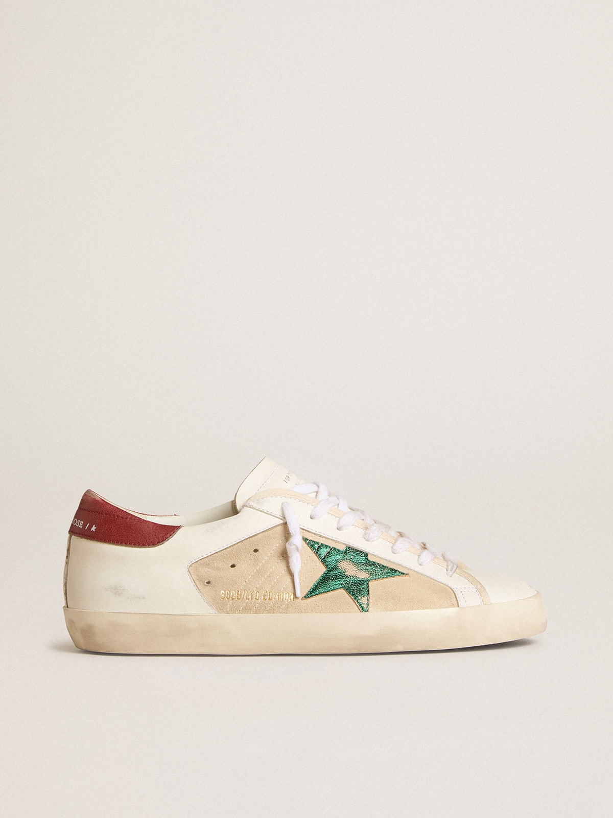Golden Goose GGDB Men's Super-Star LTD in suede with green metallic star and red heel tab