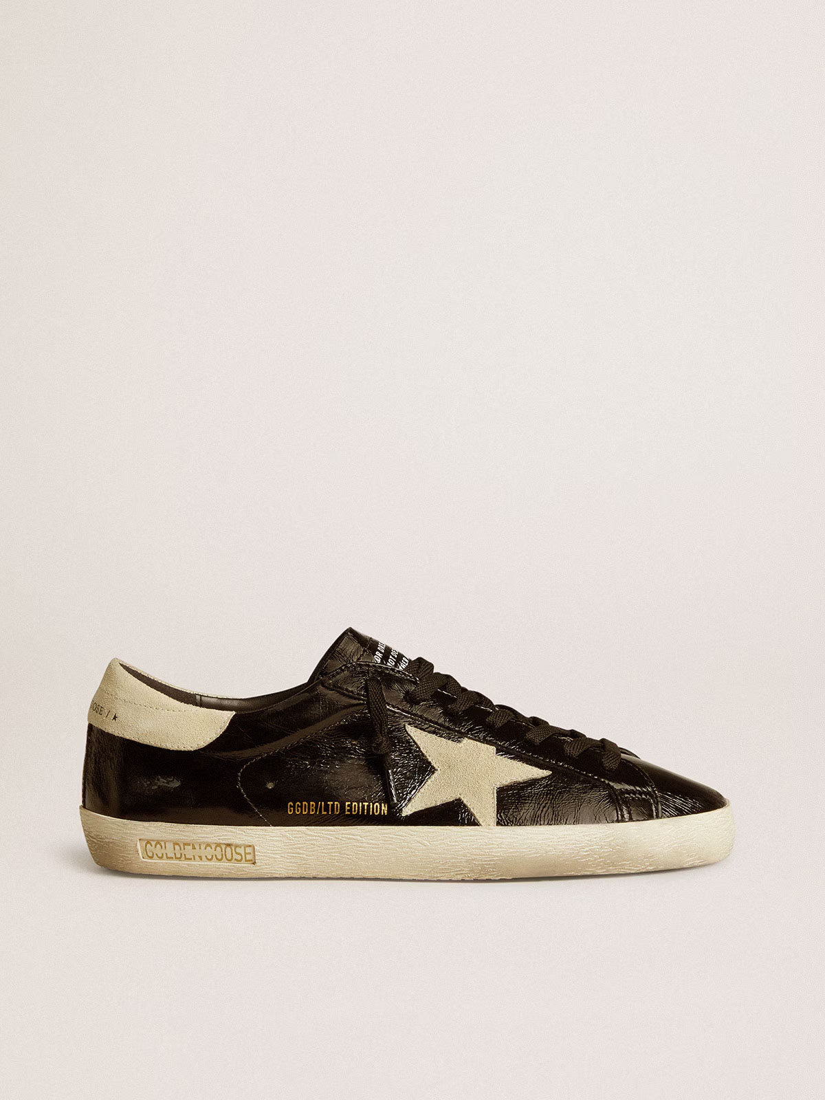 Golden Goose GGDB Men's Super-Star LTD in black patent leather with suede star and heel tab